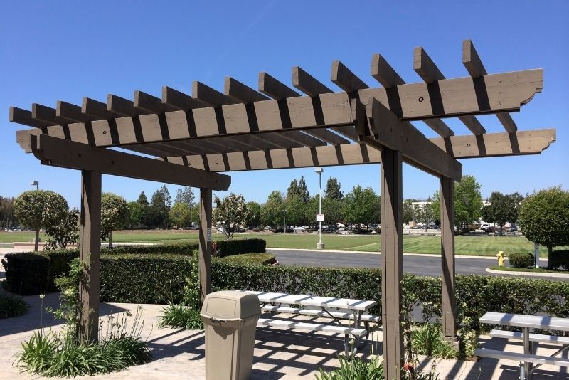 metal pergola with canopy and sides