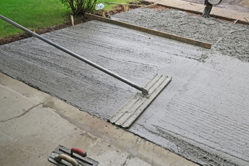 adding concrete to existing slab
